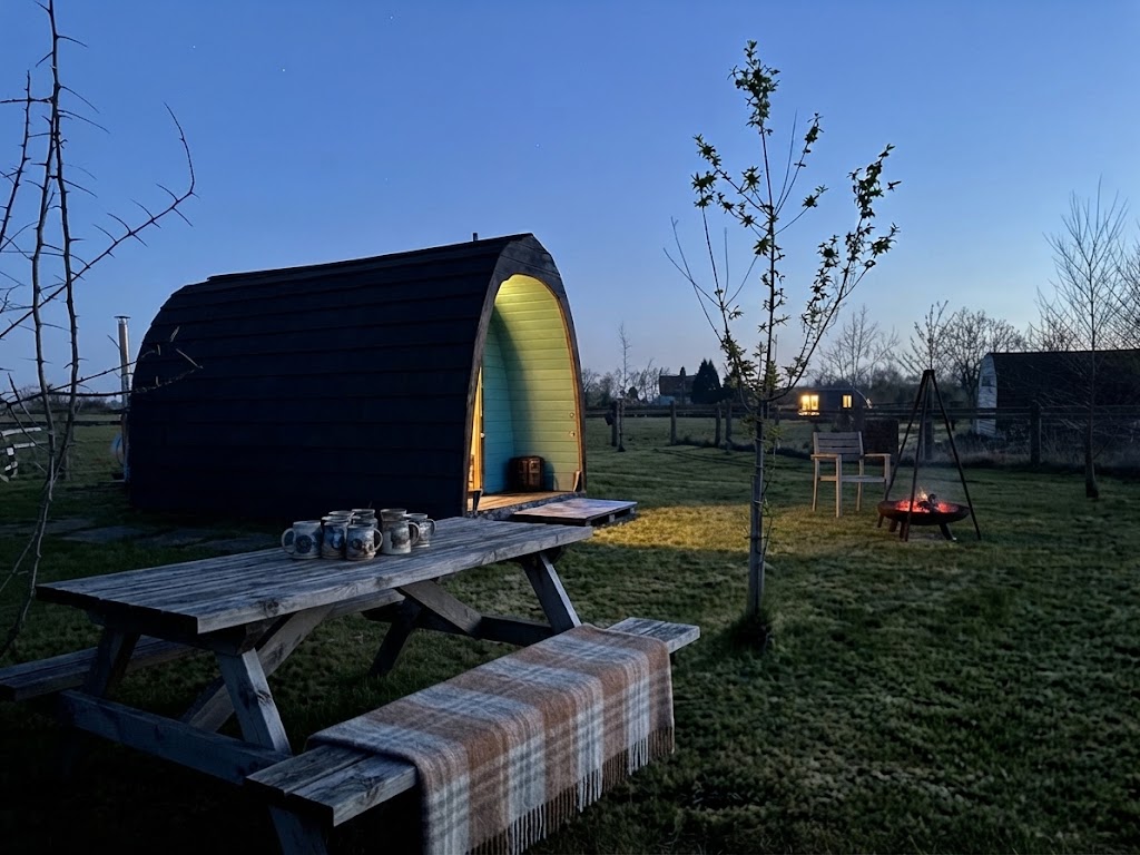 Eco glamping cabin with solar panels in a Pembrokeshire meadow